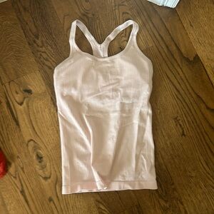 Lululemon - three pieces, top leggings and shorts!! Great condition
